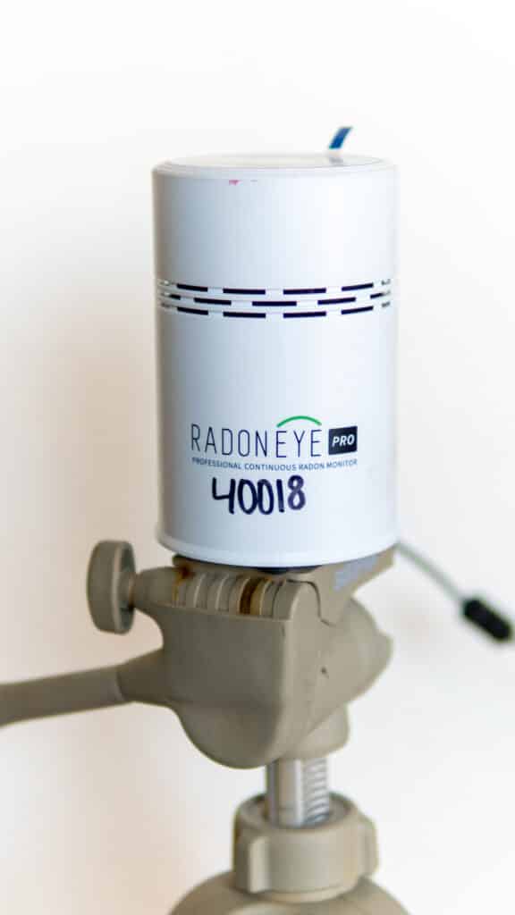 Radon testing device on a tripod